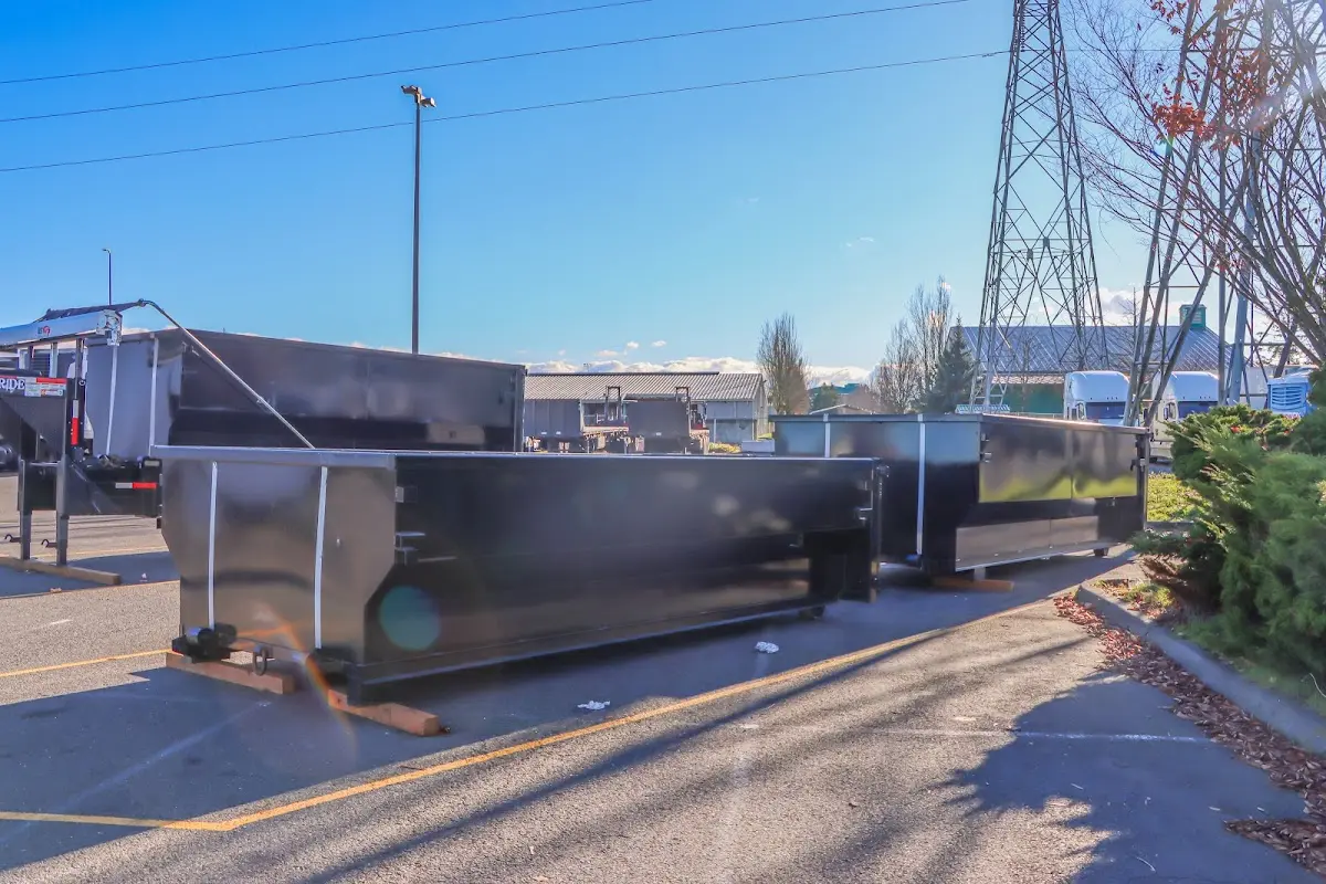 Roll-off dumpster ready for waste disposal at job site for 15 Yard Dumpster Rental in Artesia